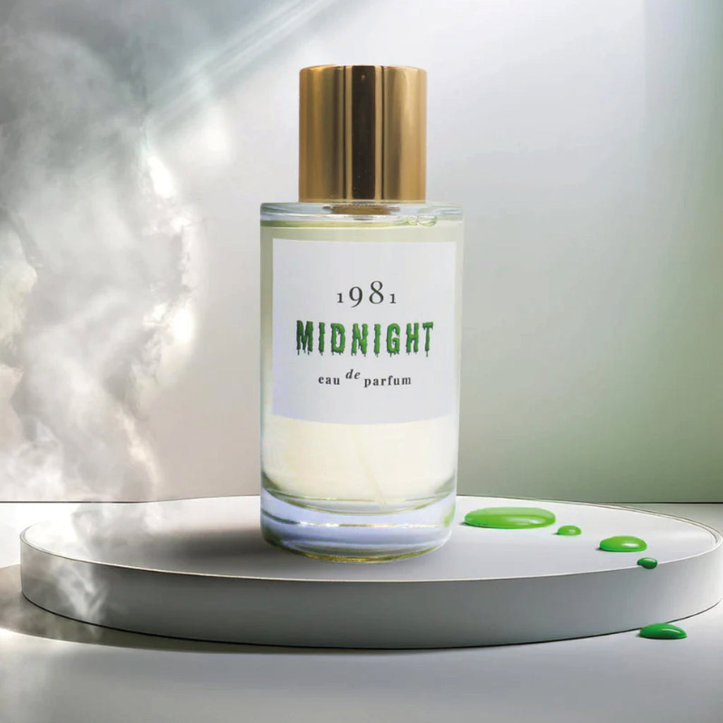 Perfume bottle labeled '1981 Midnight' on a white platform with a greenish background.
1981 Eau de Parfum Midnight Fragrance - Jo And Co 1981 Eau de Parfum Midnight Fragrance - 1981