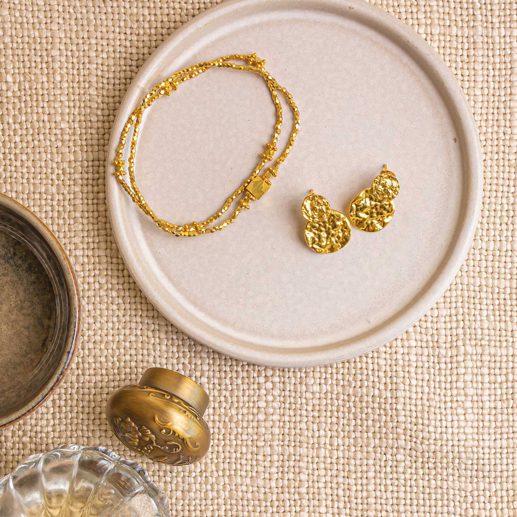 Elastic bracelet with faceted gold beads.
Ashiana London Astrid Gold Bracelet - Jo And Co Ashiana London Astrid Gold Bracelet - Ashiana London