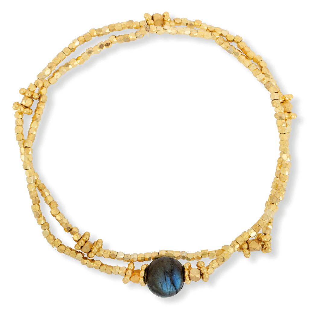 Pair of gold stretch bracelets with faceted gold beads and polished Labradorite bead. 
Ashiana London Bluebell Labradorite Bracelet - Jo And Co Ashiana London Bluebell Labradorite Bracelet - Ashiana London