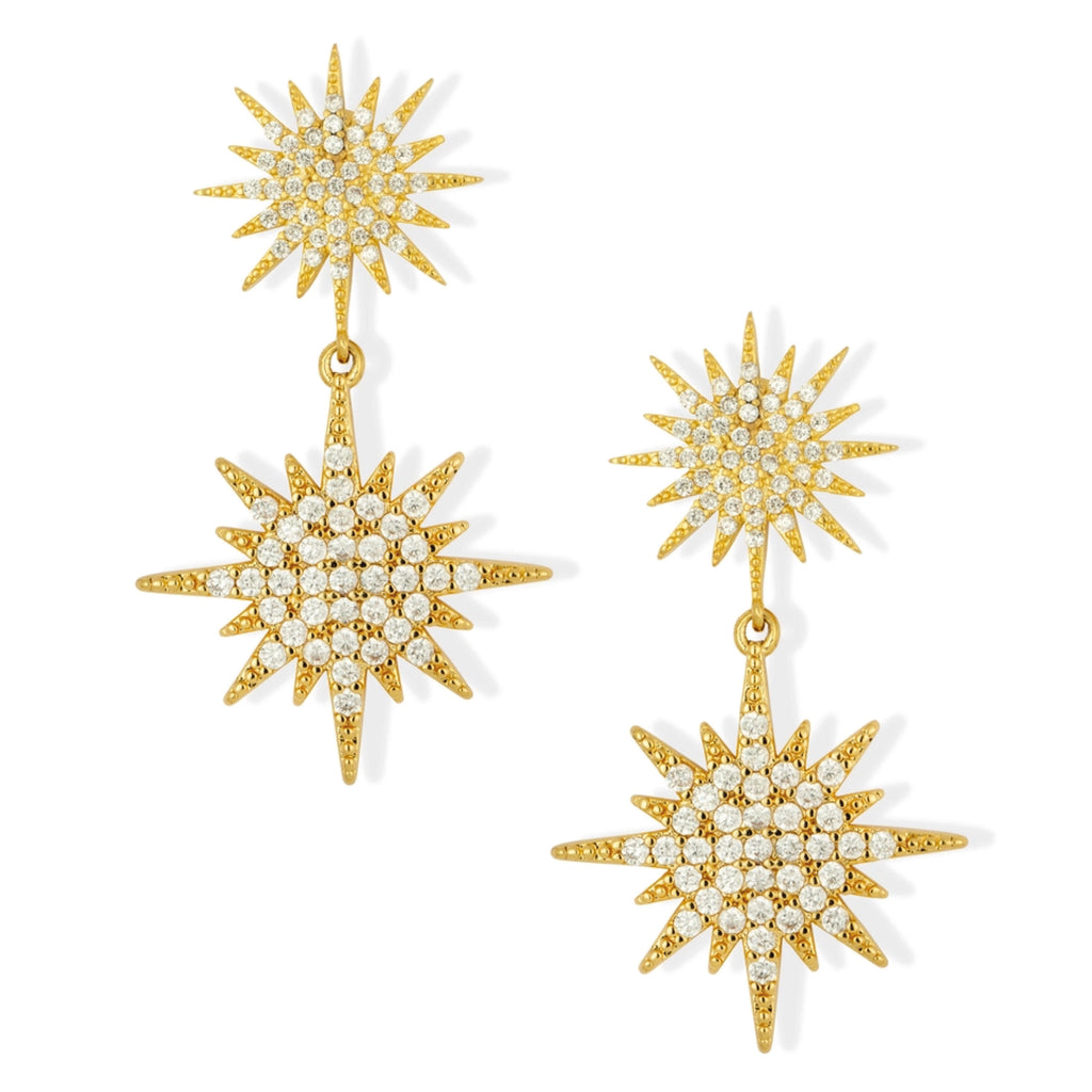 Gold earrings with sparkling crystals and starburst design.
Ashiana London Elsa Star Gold Earrings - Jo And Co Ashiana London Elsa Star Gold Earrings - Ashiana London