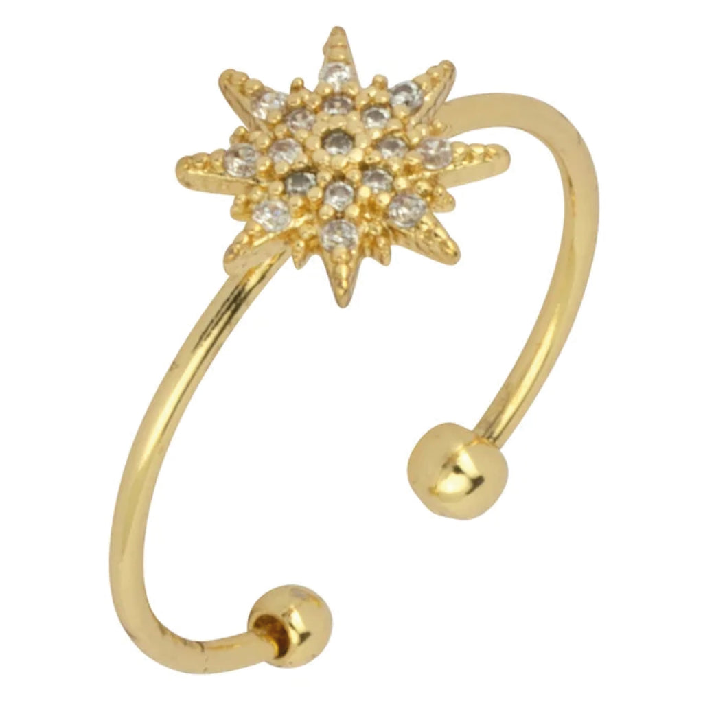 Gold adjustable ring with star-shaped gemstone.
Ashiana London Mila Star Ring - Jo And Co Ashiana London Mila Star Ring - Ashiana London