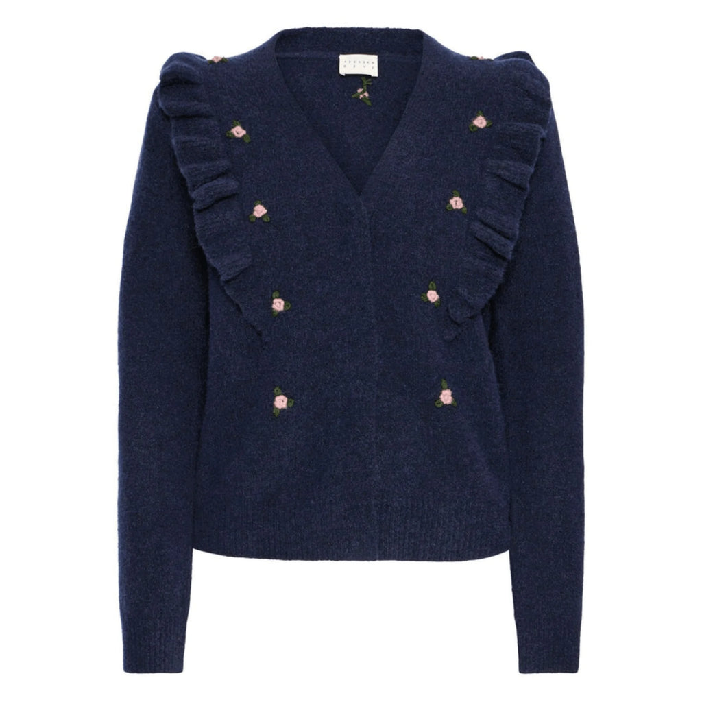 Navy blue sweater with ruffled shoulders and pink flower embroidered embellishments.
Atelier Reve Maritime Blue Morris Cardigan - Jo And Co Atelier Reve Maritime Blue Morris Cardigan - Atelier Reve