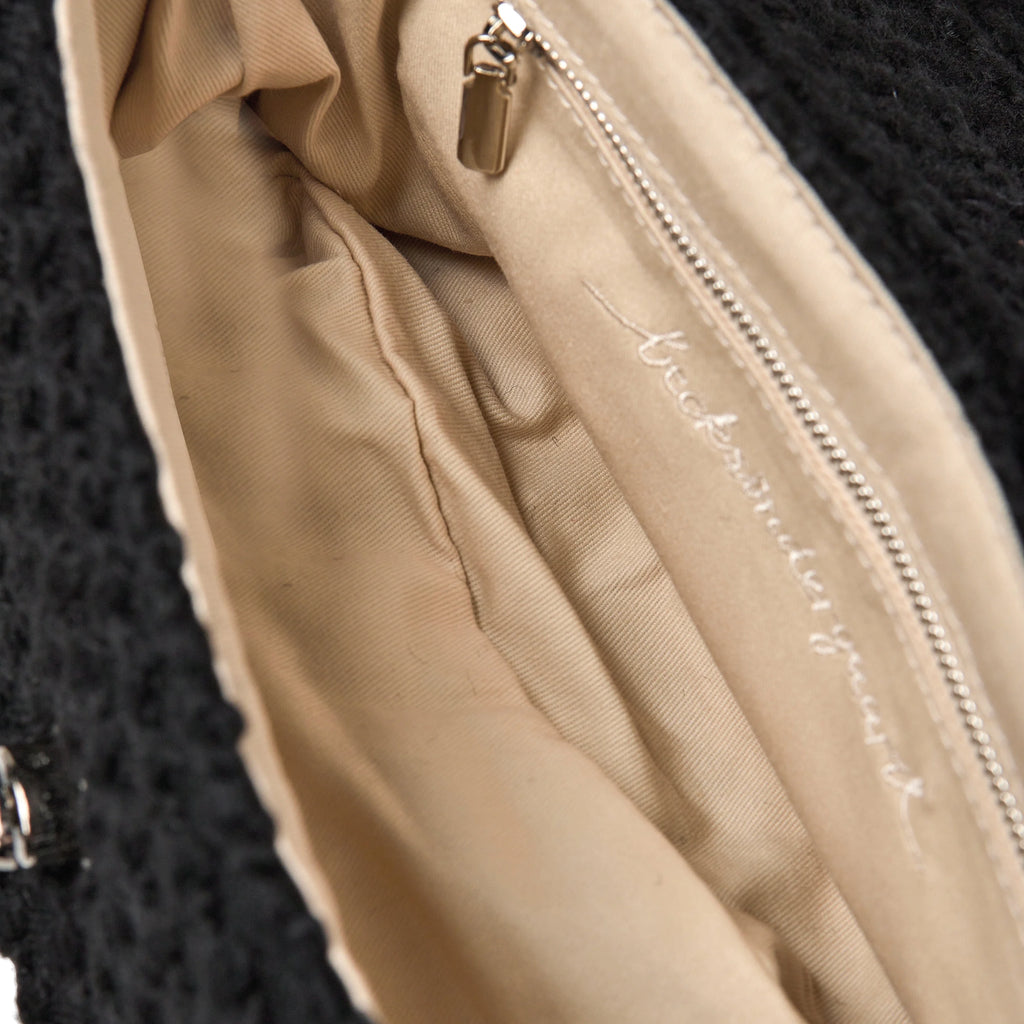 Black handbag with chain strap.
Beck Sondergaard Black Ashby Hollis Bag - Jo And Co Beck Sondergaard Black Ashby Hollis Bag - Beck Sondergaard