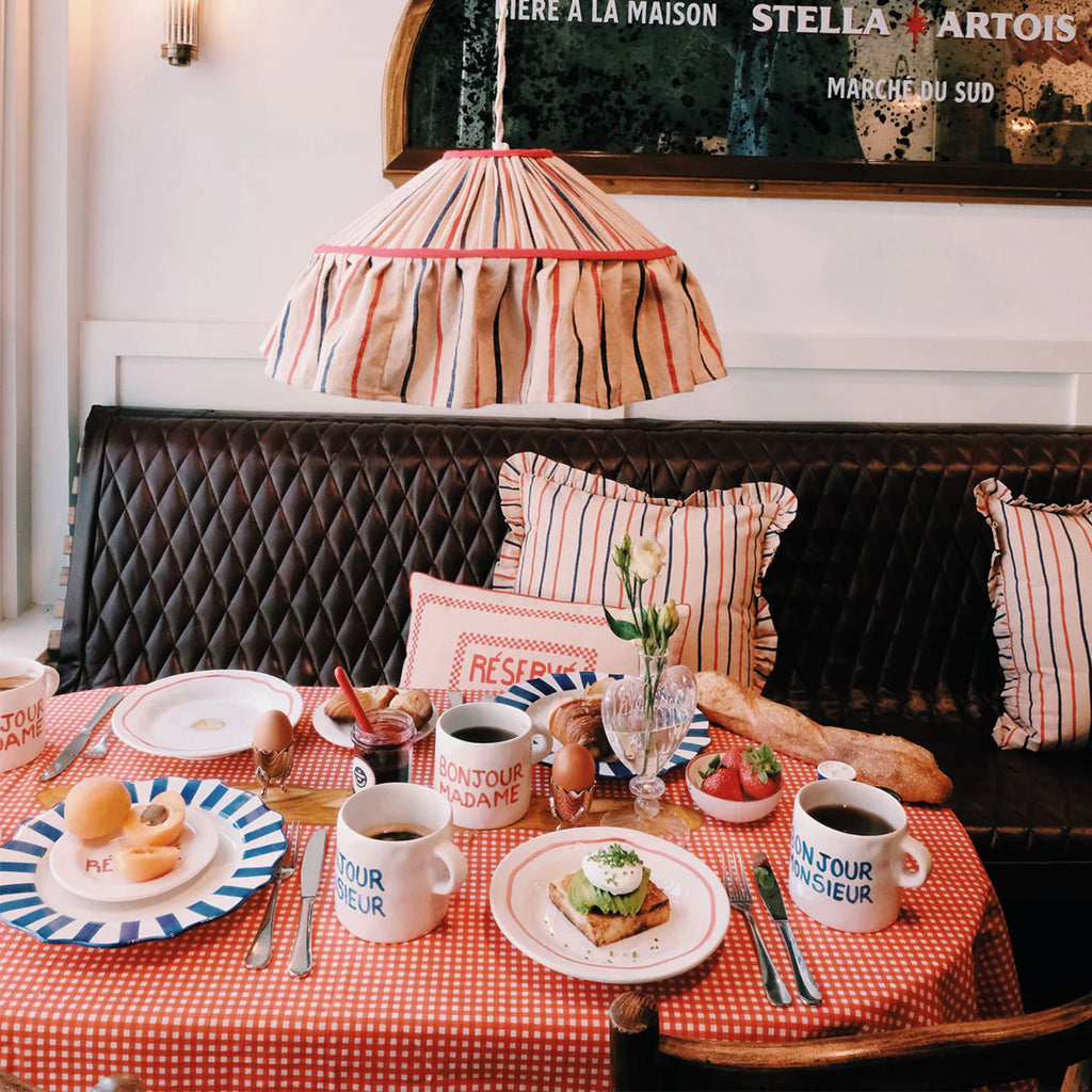 White ceramic Bonjour Madame Mug with red handwritten text and a rounded handle.
Bonjour Madame Mug - Jo And Co Bonjour Madame Mug - Anna + Nina