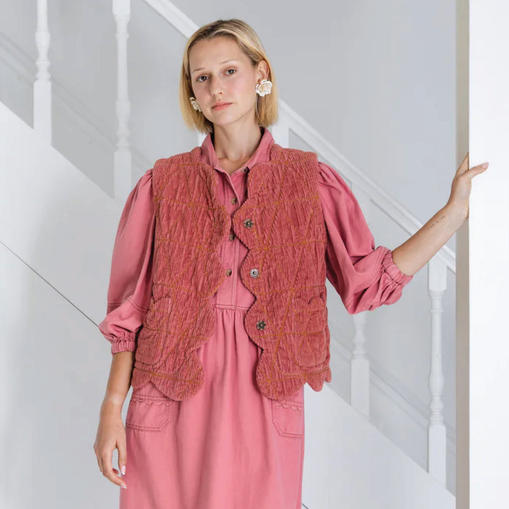 Rose pink quilted gilet in jumbo-cord with scallop edge detail.
Bonté Rose Estelle Gilet - Jo And Co Bonté Rose Estelle Gilet - Bonté