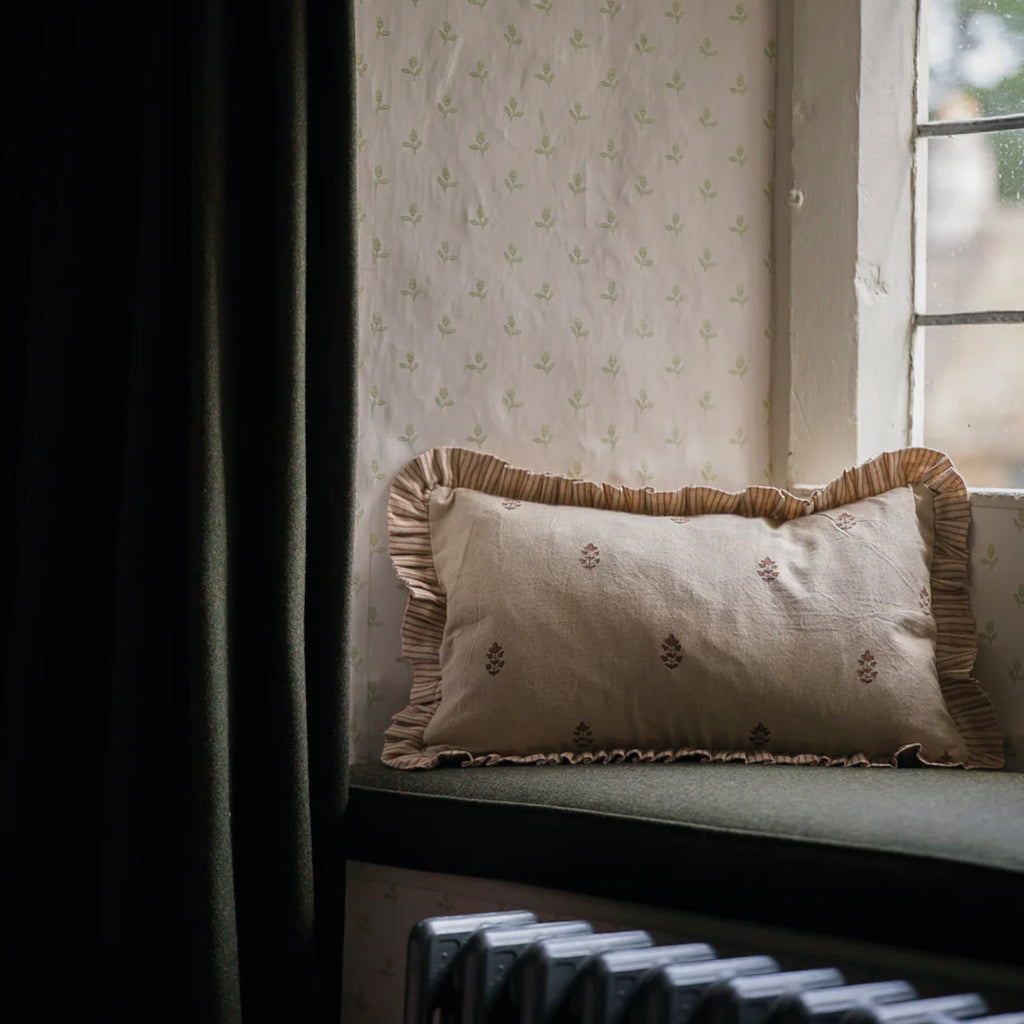 Cushion with floral design and complimentary striped trim.
Brick Sprig Blockprint Cushion - Jo And Co Brick Sprig Blockprint Cushion