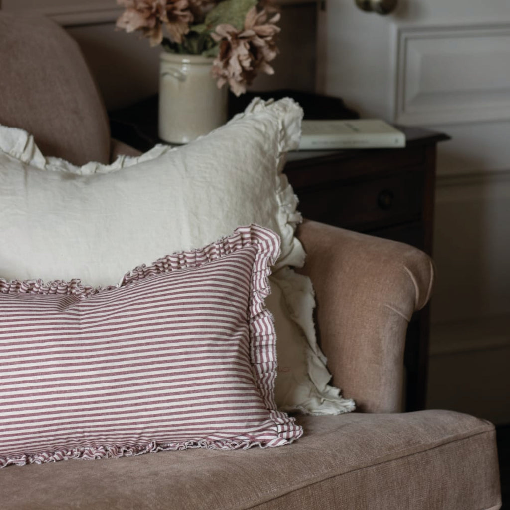 Striped cotton cushion with ruffled edges.
Burgundy Stripe Ruffle Darcy Cushion - Jo And Co Burgundy Stripe Ruffle Darcy Cushion