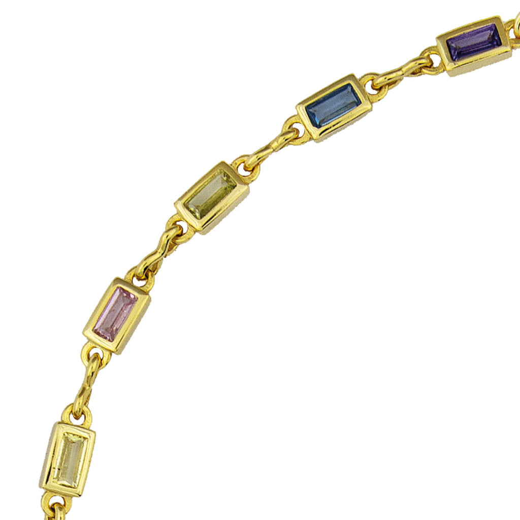 Gold necklace with colourful gemstones.
Carnival Choker - Jo And Co Carnival Choker