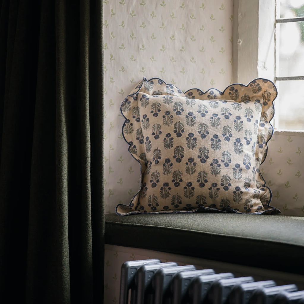 Beige cushion with denim blue block print floral motif pattern and a scalloped edge in denim blue.
Denim Scallop Blockprint Cushion - Jo And Co Denim Scallop Blockprint Cushion