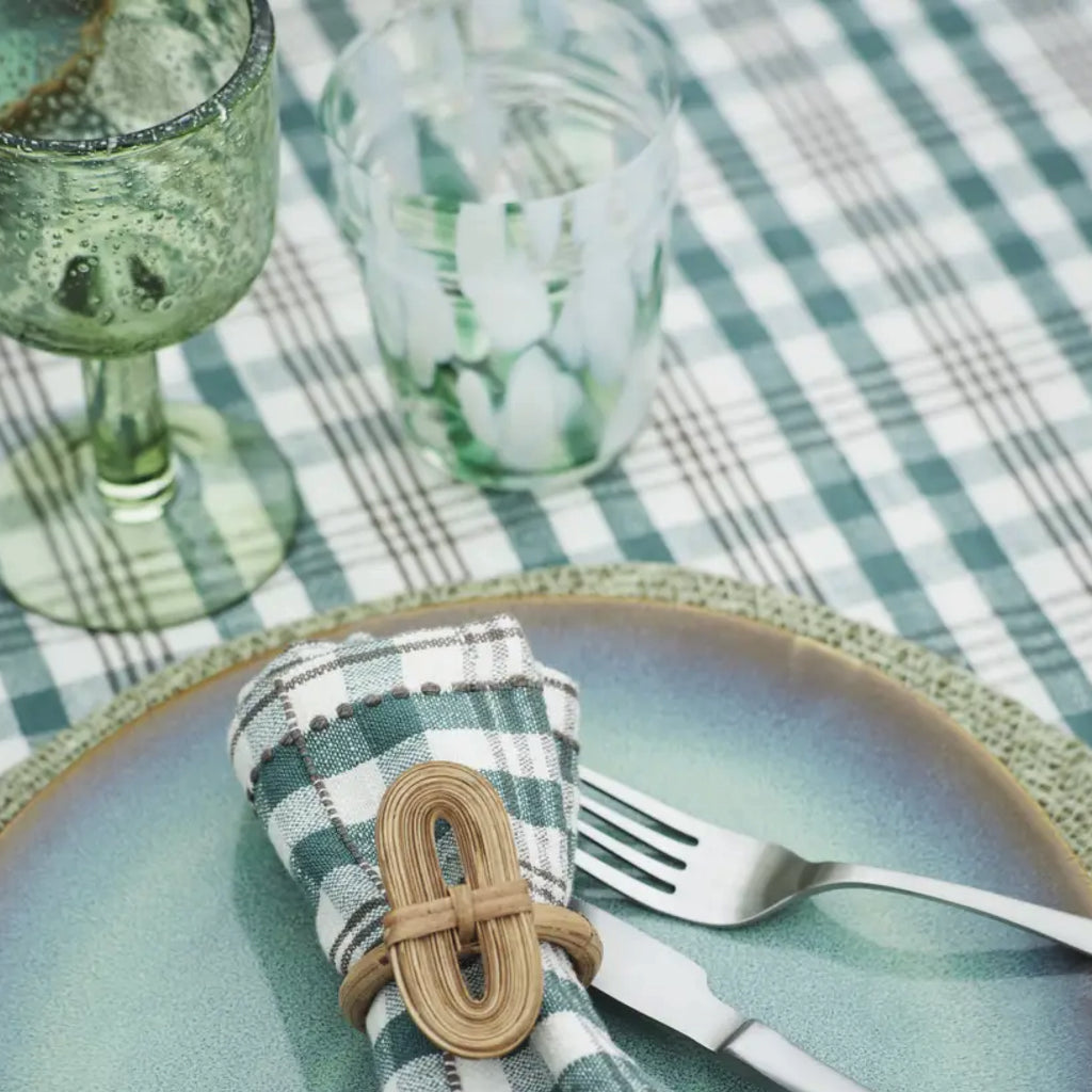 Green wine glass with a textured surface and bubbles.
Green Coloured Wine Glass - Jo And Co Green Coloured Wine Glass