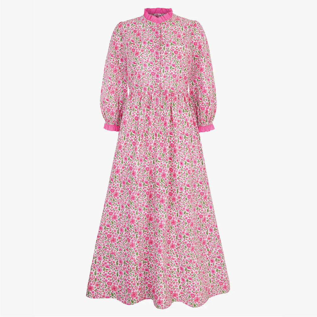 Jo And Co Pink City Prints Hollyhock Meadow Tilly Dress_Finished with a pretty, pink solid frill and covered buttons, our bestselling Tilly dress is a versatile addition to your wardrobe. Block-printed by hand in our pretty, new Hollyhock Meadow ditsy, the Tilly dress has a gently fitted waist, button down placket and gathered, pin-tucked skirt. Dress up with heeled boots, or throw on everyday with trainers.