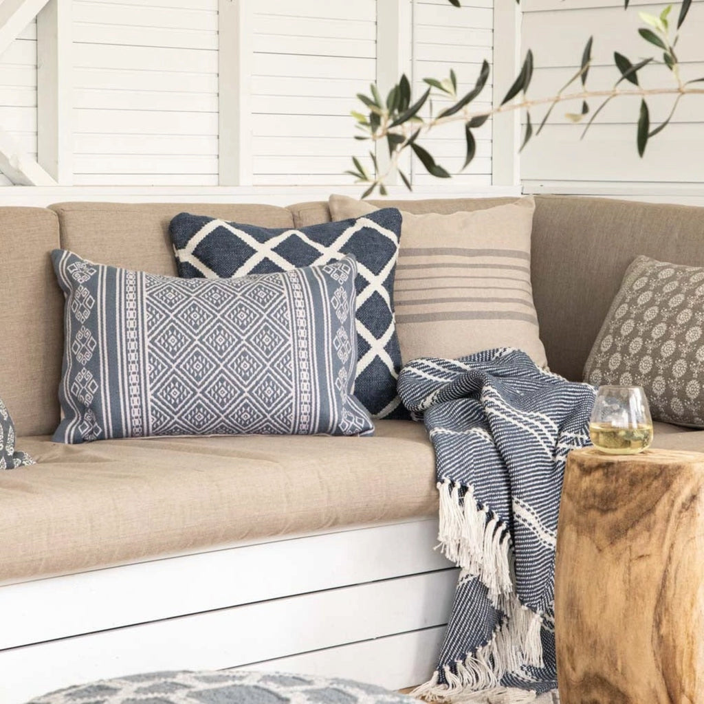 Blue and white patterned cushion with geometric weave.
Kalkan Navy Cushion - Jo And Co Kalkan Navy Cushion