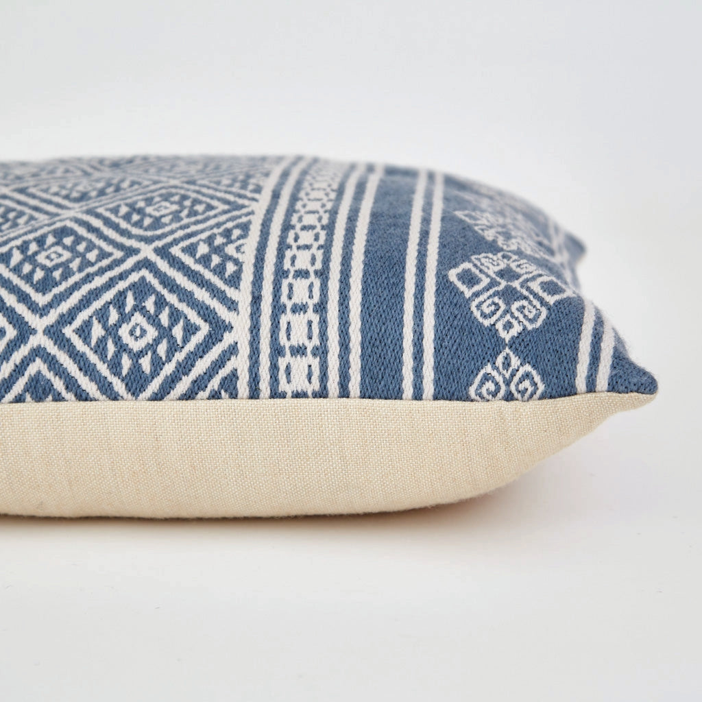 Blue and white patterned cushion with geometric weave.
Kalkan Navy Cushion - Jo And Co Kalkan Navy Cushion