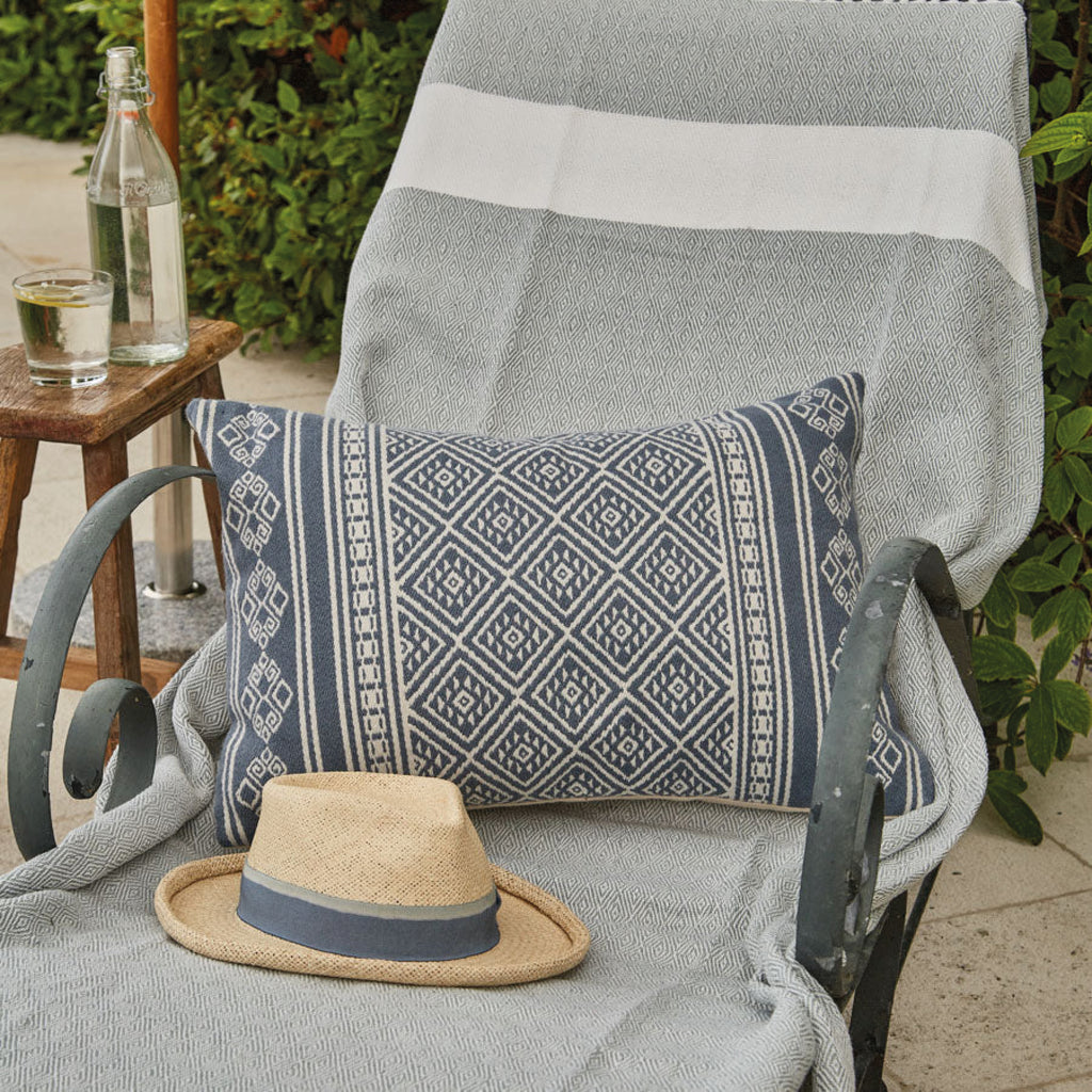 Blue and white patterned cushion with geometric weave.
Kalkan Navy Cushion - Jo And Co Kalkan Navy Cushion