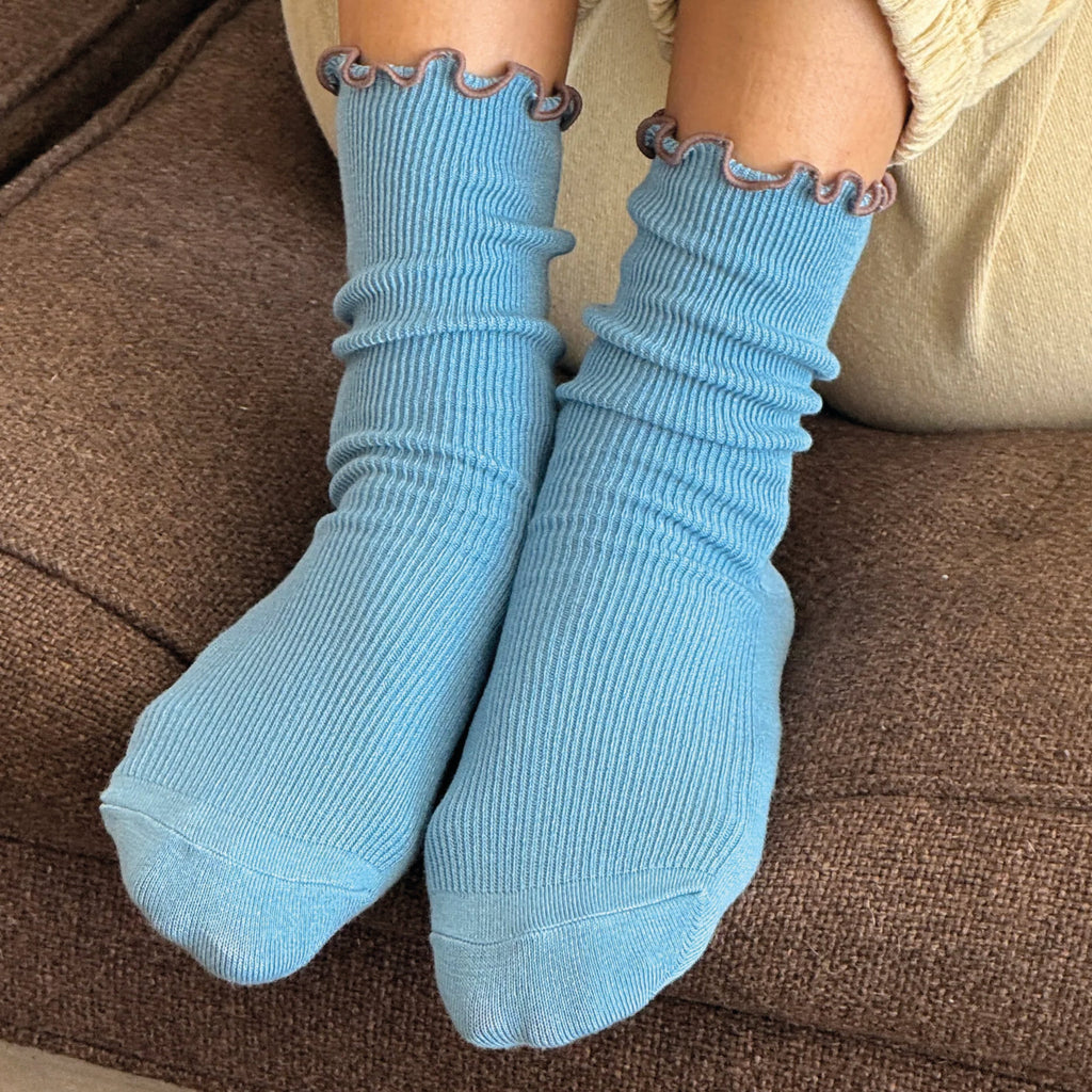 Blue socks with ruffled brown top.
Le Bon Shoppe Ruffled Modal Powder Blue Socks - Jo And Co Le Bon Shoppe Ruffled Modal Powder Blue Socks - Le Bon Shoppe