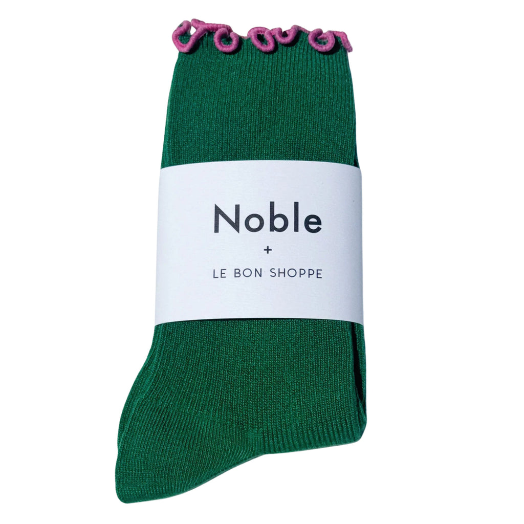 Green sock with pink ruffled trim.
Le Bon Shoppe Ruffled Modal Spinach Socks - Jo And Co Le Bon Shoppe Ruffled Modal Spinach Socks - Le Bon Shoppe