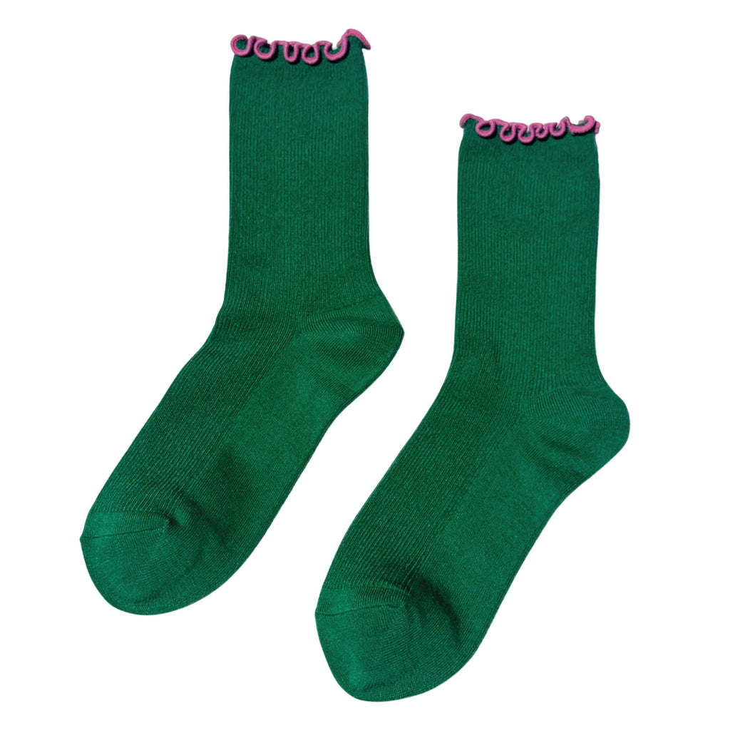 Green sock with pink ruffled trim.
Le Bon Shoppe Ruffled Modal Spinach Socks - Jo And Co Le Bon Shoppe Ruffled Modal Spinach Socks - Le Bon Shoppe