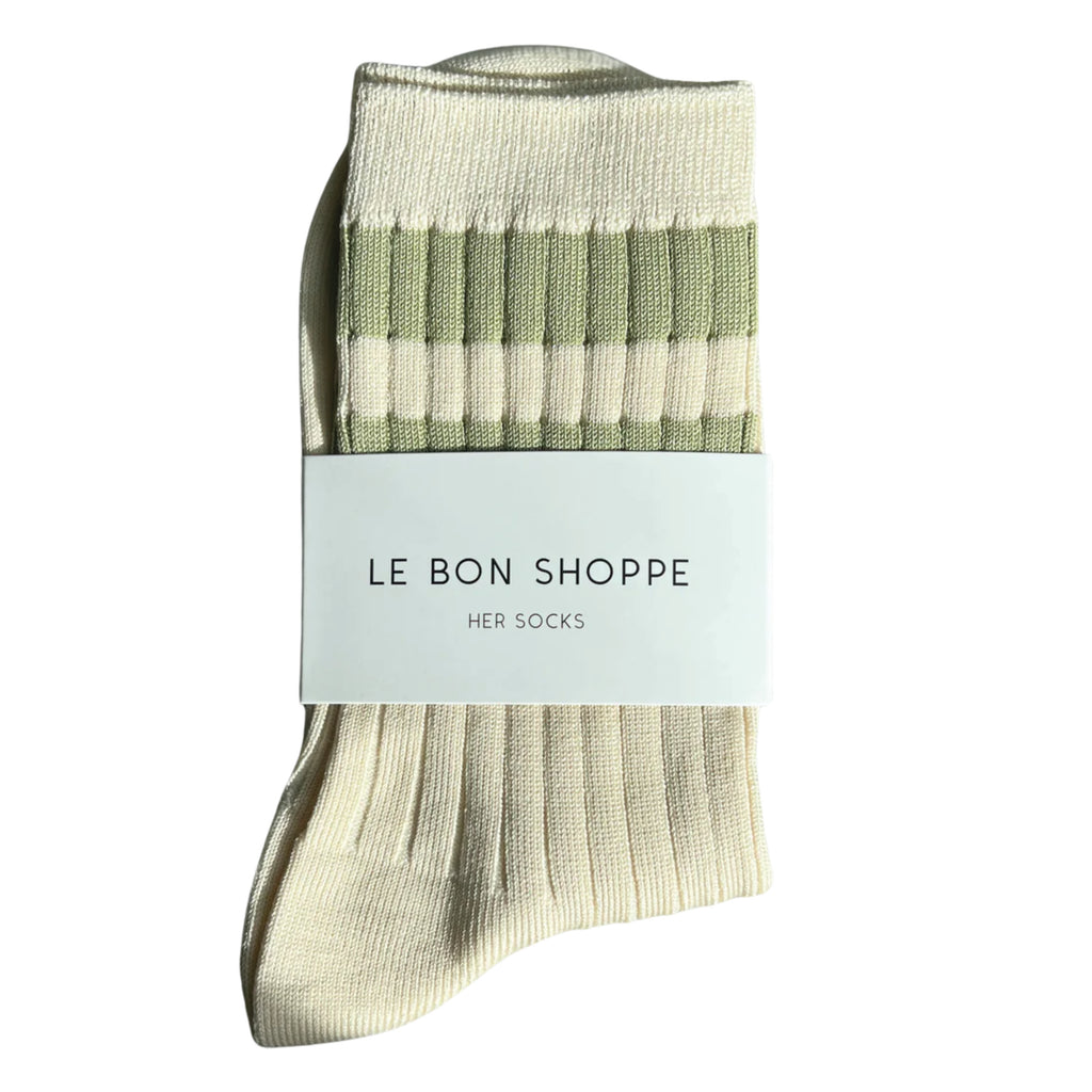 Sporty cream socks with green stripe with ribbed design and quarter-crew length.
Le Bon Shoppe Guacamole Varsity Her Socks - Jo And Co Le Bon Shoppe Guacamole Varsity Her Socks - Le Bon Shoppe