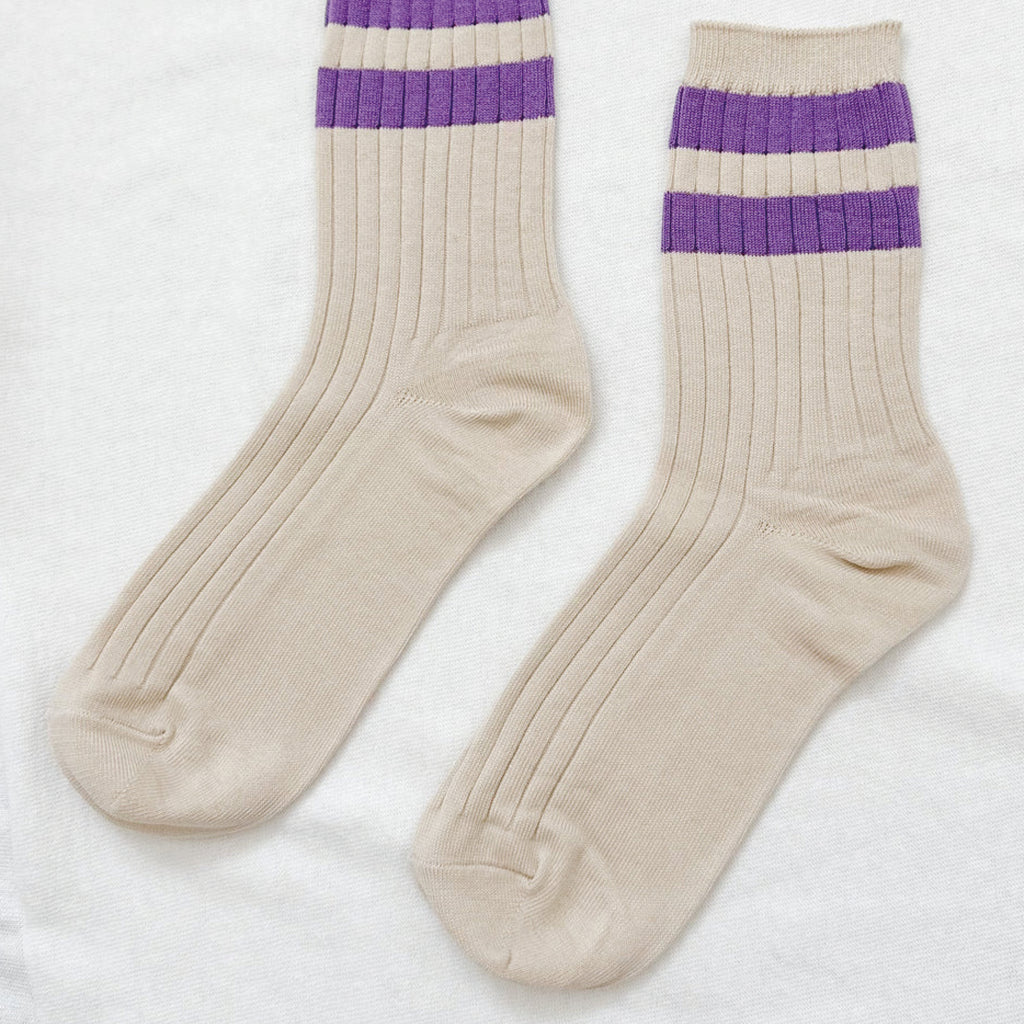 Sporty cream socks with purple stripe with ribbed design andquarter-crew length.
Le Bon Shoppe Ube Varsity Her Socks - Jo And Co Le Bon Shoppe Ube Varsity Her Socks - Le Bon Shoppe