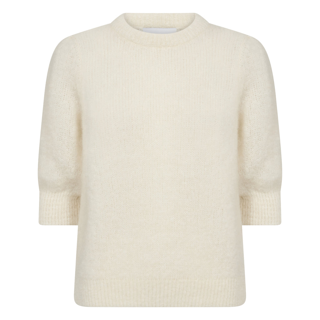 Cream white mohair knit with round neckline, three-quarter sleeves, and a ribbed texture.
Leveté Room Star White Noreen Knit - Jo And Co Leveté Room Star White Noreen Knit - Leveté Room