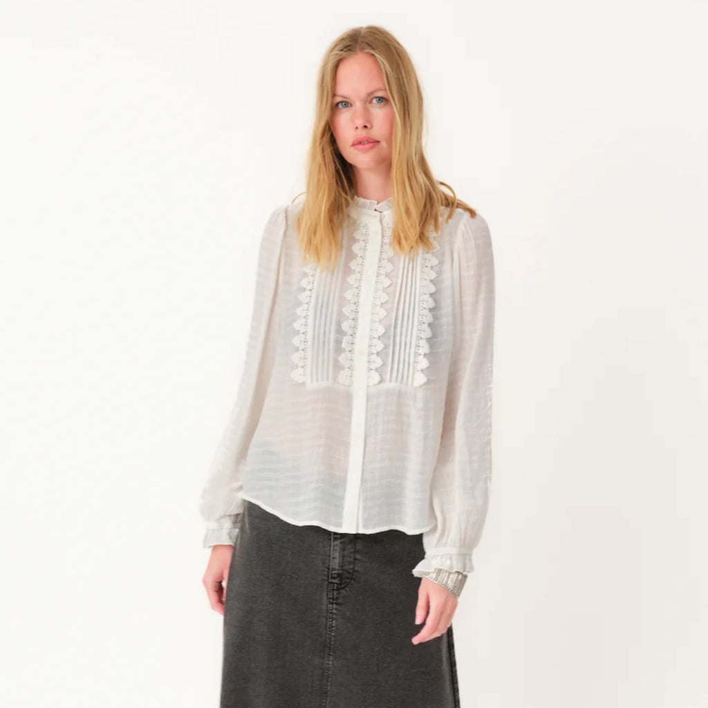 White blouse with a high collar.
Lollys Laundry White Ariel Shirt - Jo And Co Lollys Laundry