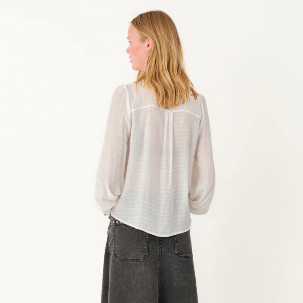 White blouse with a high collar.
Lollys Laundry White Ariel Shirt - Jo And Co Lollys Laundry