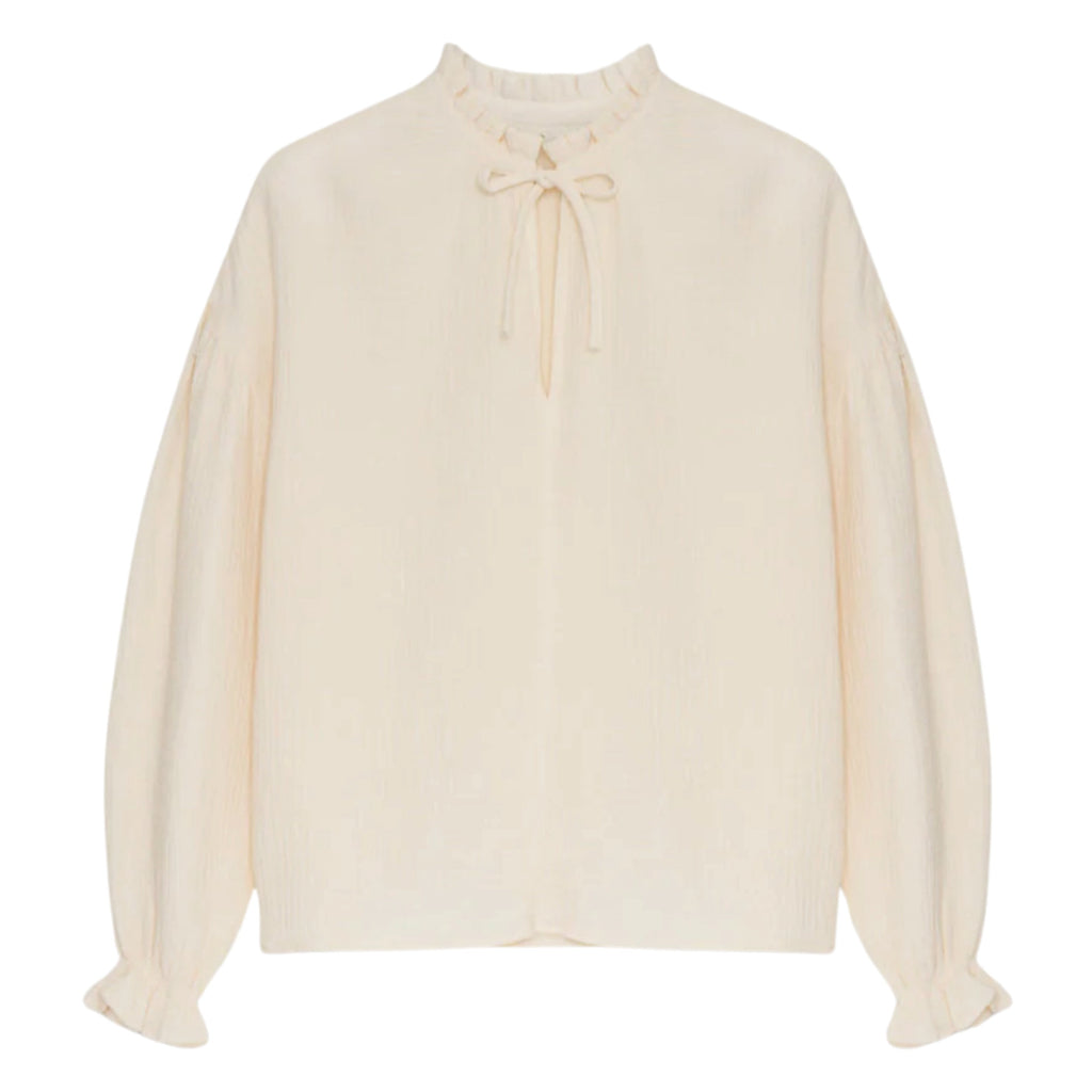 Cream-colored blouse with a bow detail.
Moonlight White Olivia Blouse - Jo And Co Moonlight White Olivia Blouse - The New Society