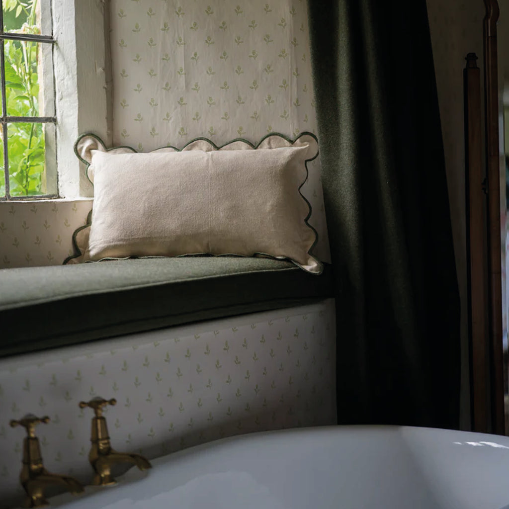 Beige cotton cushion with moss green scalloped edge.
Moss Scallop Cushion - Jo And Co Moss Scallop Cushion