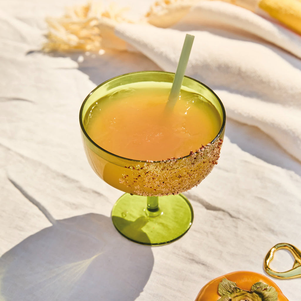 Two green glass margarita glasses.
Olive Margarita Glasses Set of 2 - Jo And Co Olive Margarita Glasses Set of 2 - Designworks Ink