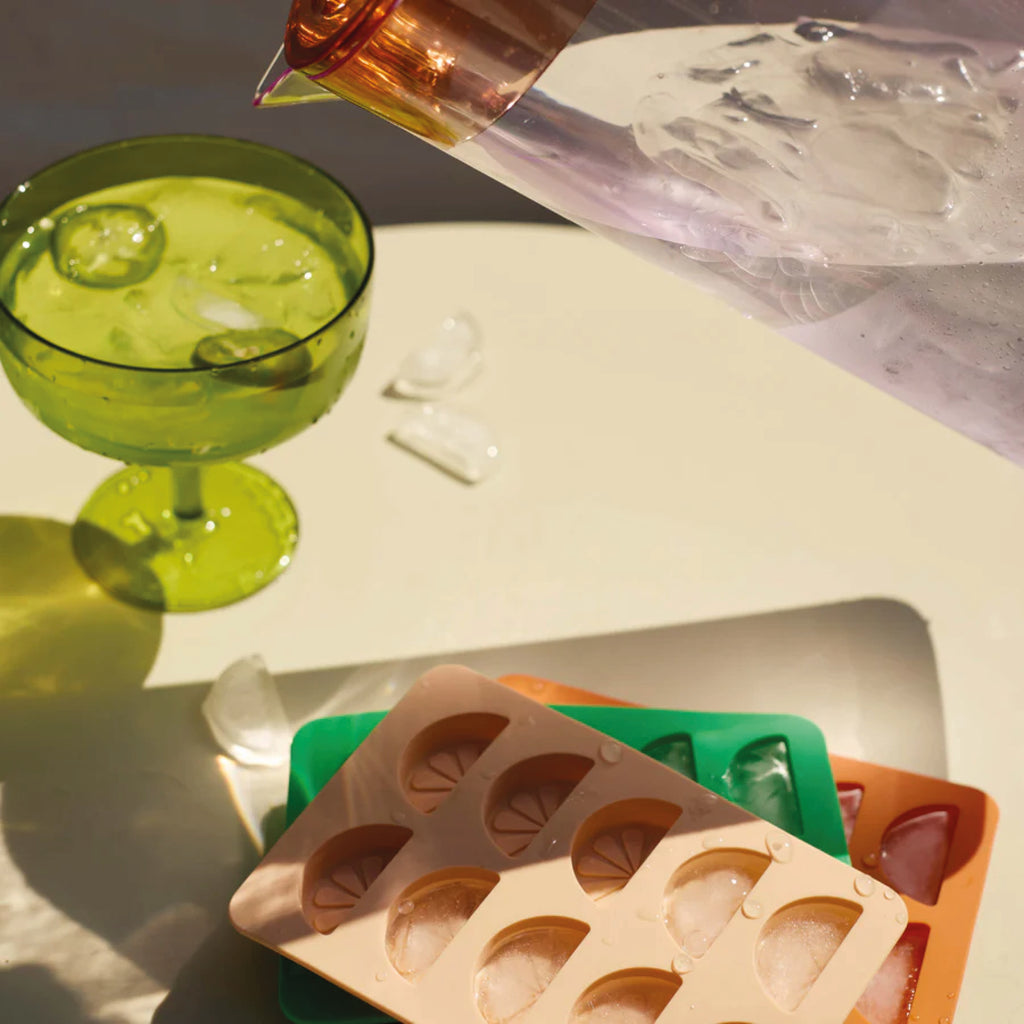 Two green glass margarita glasses.
Olive Margarita Glasses Set of 2 - Jo And Co Olive Margarita Glasses Set of 2 - Designworks Ink