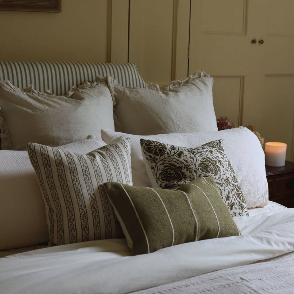 Green olive rectangular cushion with thin white stripes.
Olive Rectangular Stripe Luxe India Cushion - Jo And Co Olive Rectangular Stripe Luxe India Cushion