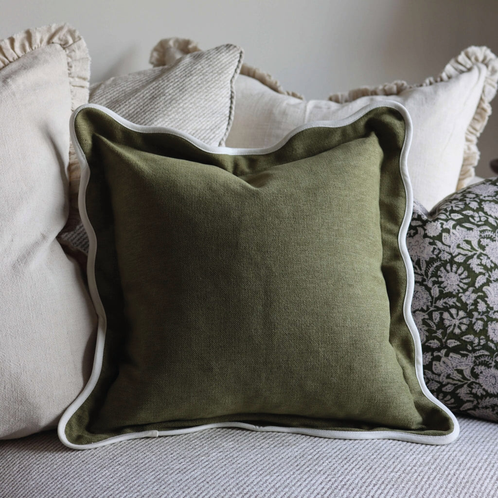 Olive green square cushion with white scalloped trim.
Olive Scalloped Chloe Cushion - Jo And Co Olive Scalloped Chloe Cushion