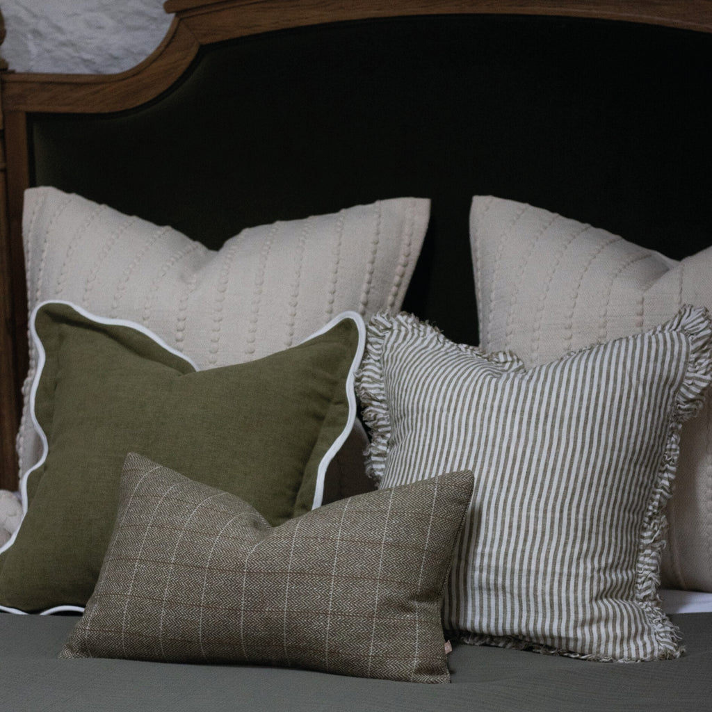 Olive green square cushion with white scalloped trim.
Olive Scalloped Chloe Cushion - Jo And Co Olive Scalloped Chloe Cushion