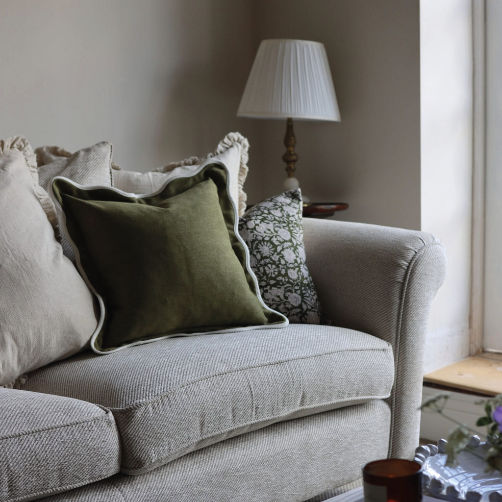 Olive green square cushion with white scalloped trim.
Olive Scalloped Chloe Cushion - Jo And Co Olive Scalloped Chloe Cushion