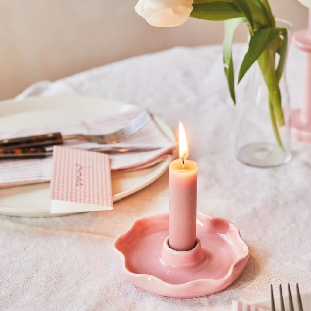 Pink ceramic candle holder with wavy edge.
Pink Scallop Candle Holder - Jo And Co Pink Scallop Candle Holder