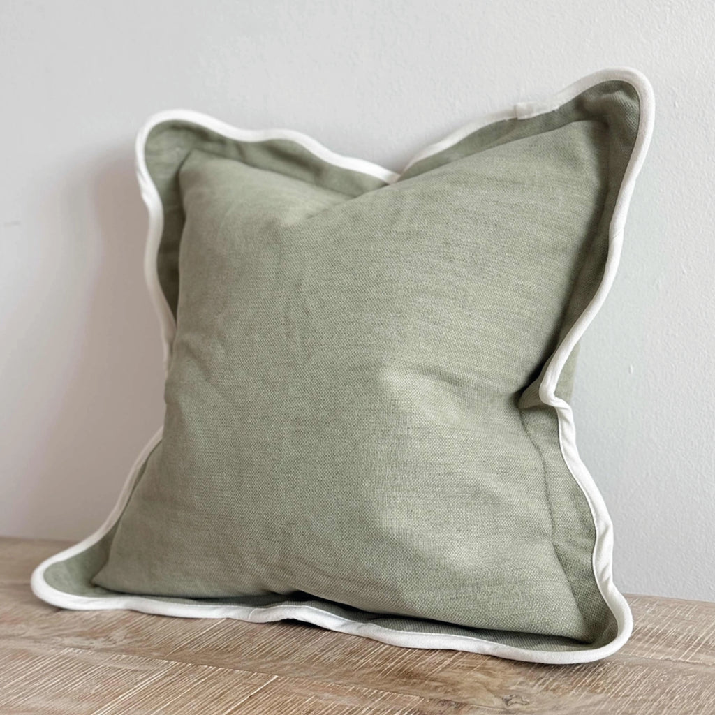 Sage green square pillow with white scalloped edge.
Sage Scalloped Chloe Cushion - Jo And Co Sage Scalloped Chloe Cushion