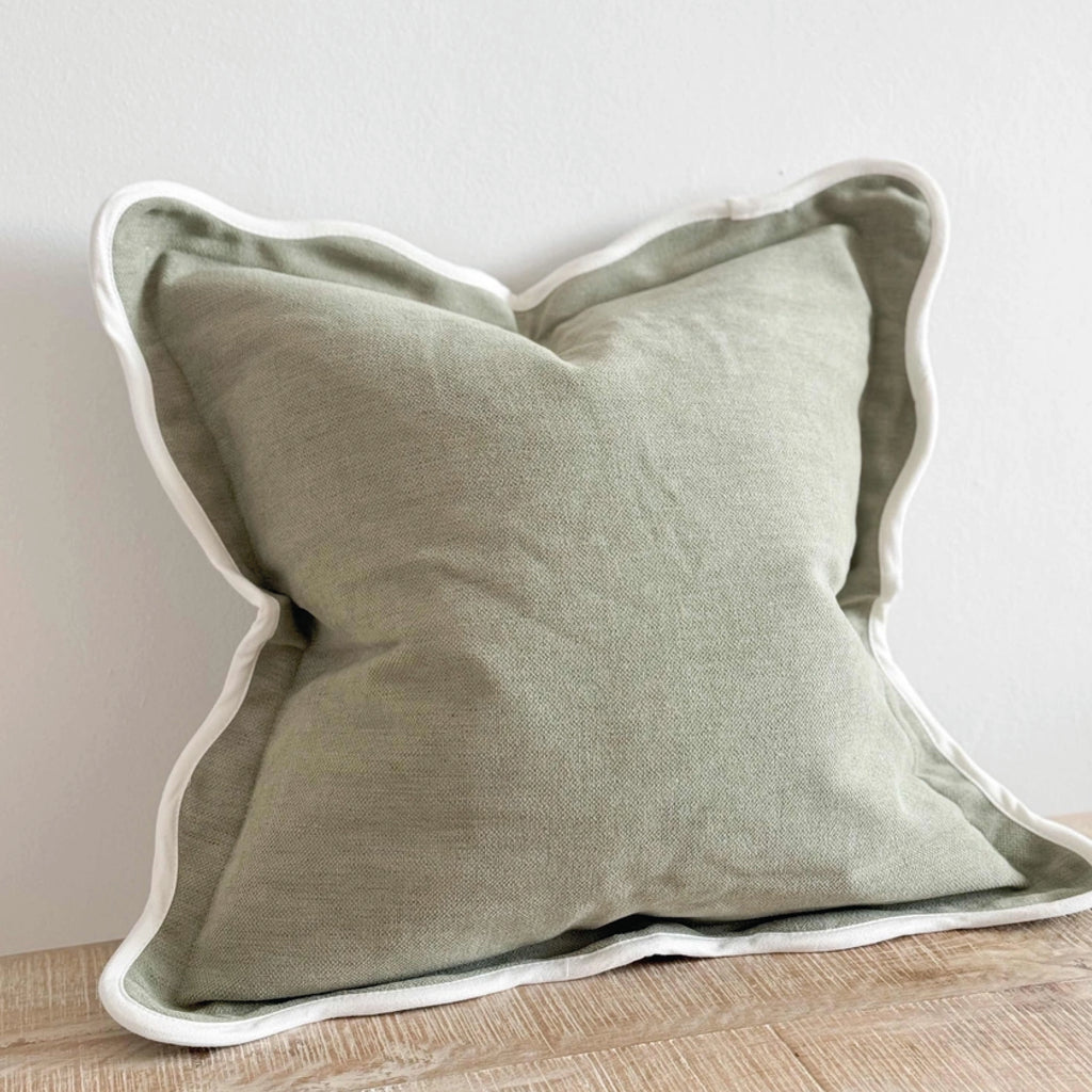 Sage green square pillow with white scalloped edge.
Sage Scalloped Chloe Cushion - Jo And Co Sage Scalloped Chloe Cushion