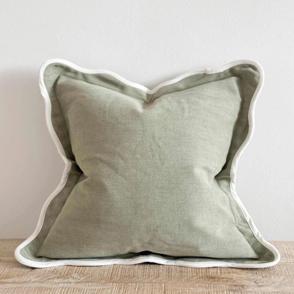 Large sage cushion with white scalloped trim.
Sage Scalloped Large Chloe Cushion - Jo And Co Sage Scalloped Large Chloe Cushion