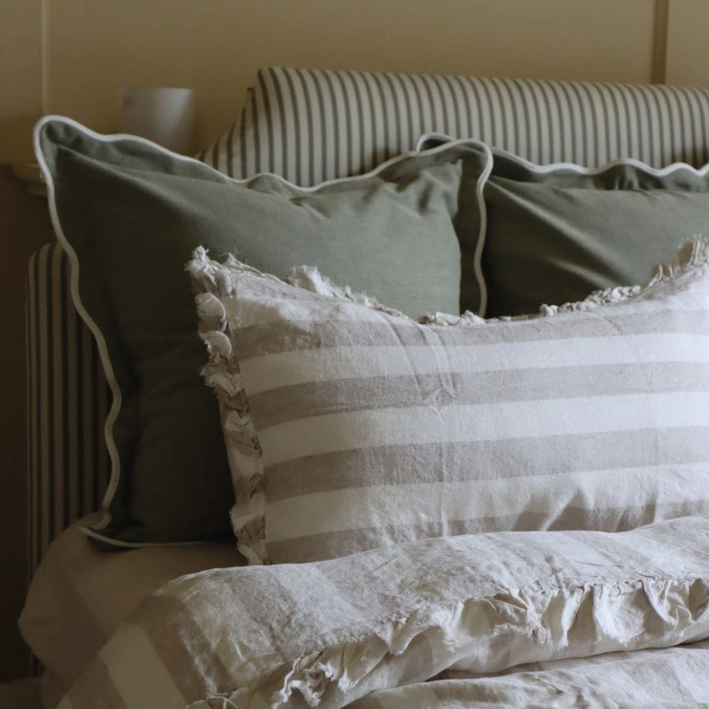 Large sage cushion with white scalloped trim.
Sage Scalloped Large Chloe Cushion - Jo And Co Sage Scalloped Large Chloe Cushion