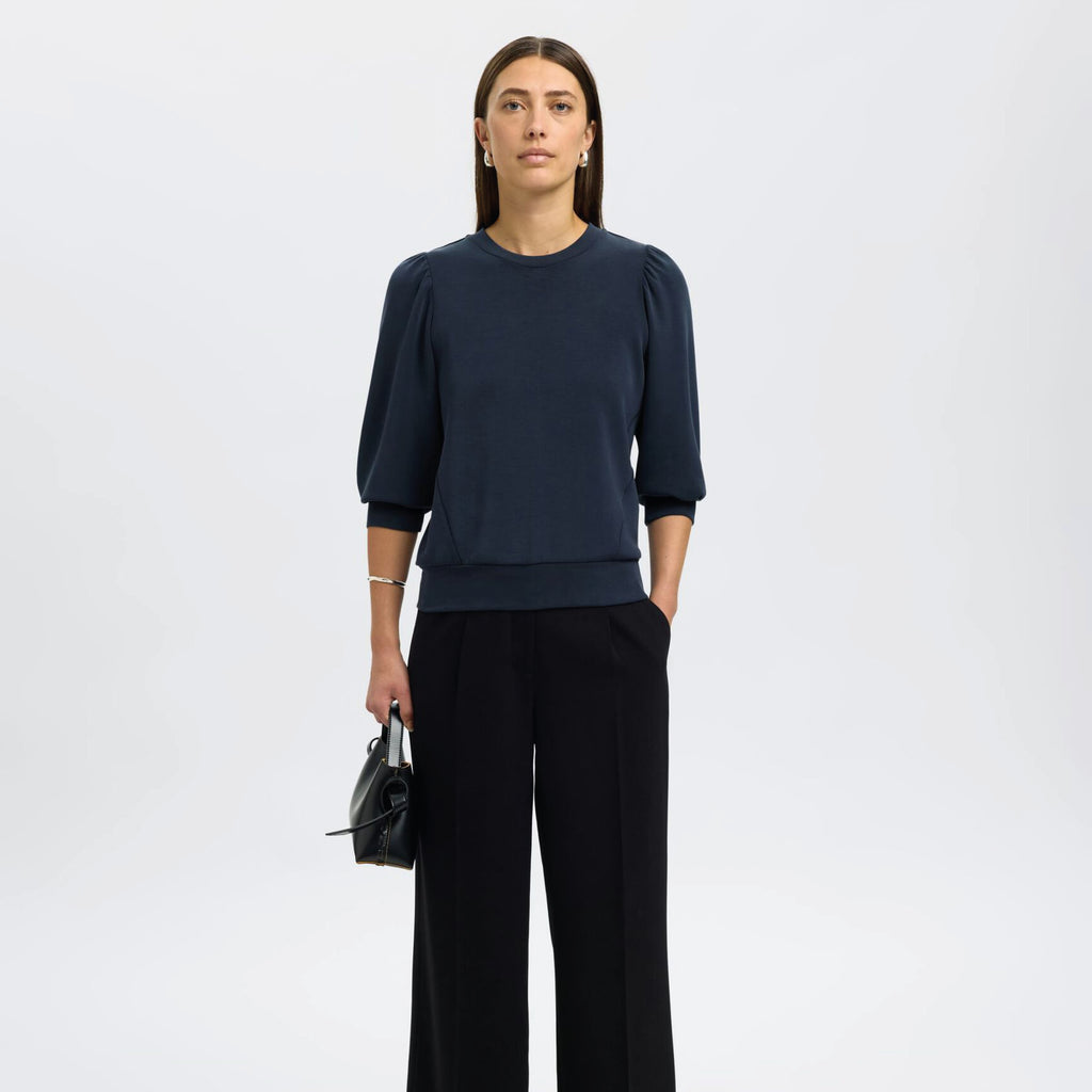 Navy blue sweater with puff sleeves.
Selected Femme Tenny Dark Sapphire Puff Sleeve Sweatshirt - Jo And Co Selected Femme Tenny Dark Sapphire Puff Sleeve Sweatshirt - Selected Femme