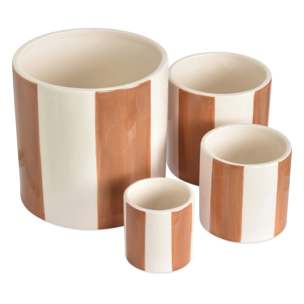 Set of four cylindrical ceramic planters with brown striped design.
Set of 4 Brown Pots - Jo And Co Set of 4 Brown Pots