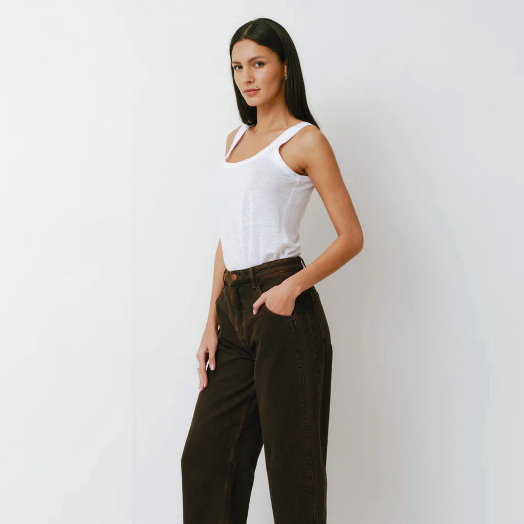 Carpenter style dark brown jeans with a super high-rise and frayed hem.
Seventy + Mochi Cacao Bo Jeans - Jo And Co Seventy + Mochi Cacao Bo Jeans - Seventy + Mochi