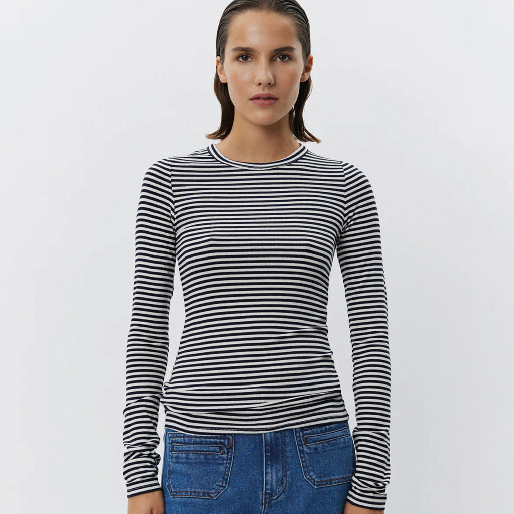 Slim-fit navy and white striped long sleeved top with round neckline.
Sofie Schnoor Navy Striped Petricia Long Sleeve Top - Jo And Co Sofie Schnoor Navy Striped Petricia Long Sleeve Top - Sofie Schnoor