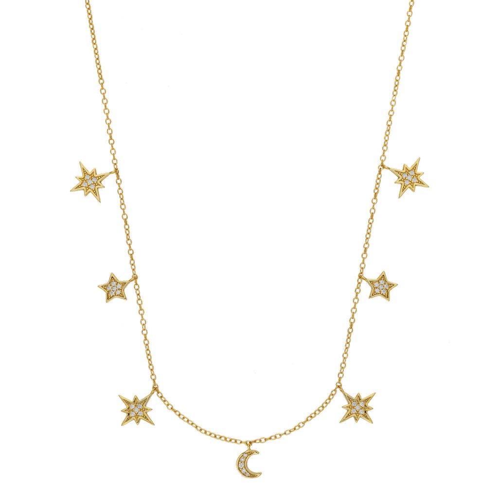 Gold necklace with star and moon shaped pendants.
Star and Moon Charm Necklace - Jo And Co Star and Moon Charm Necklace
