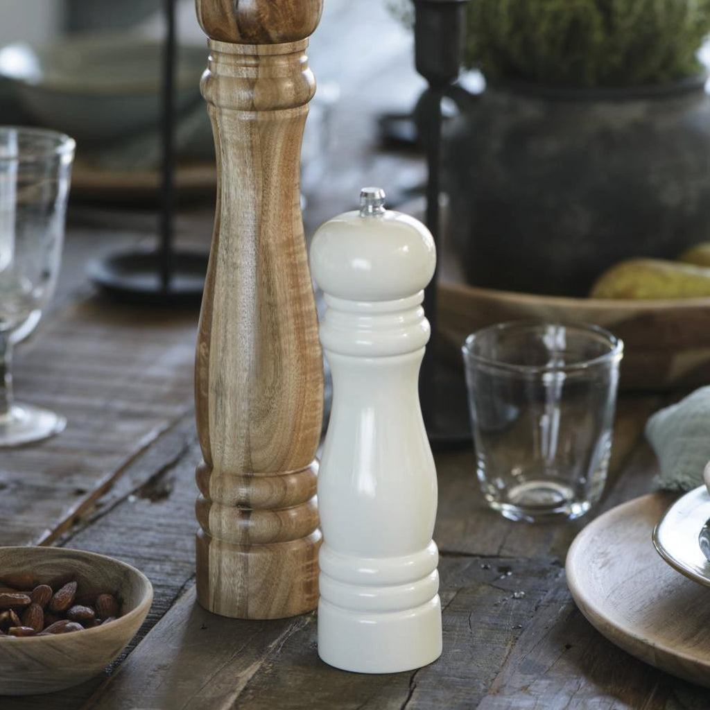 Set of two wooden salt and pepper mills.
White Salt & Pepper Mill Set - Jo And Co White Salt & Pepper Mill Set