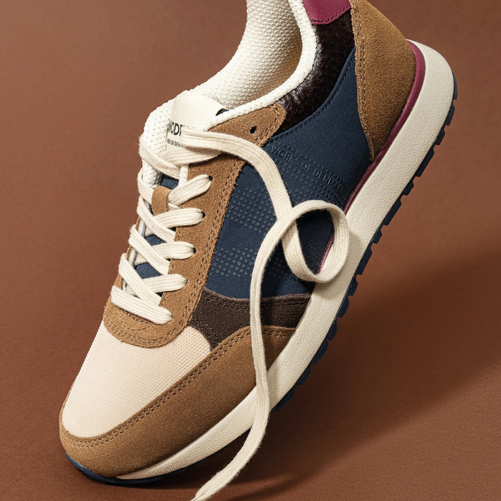 Woden Caramel Multi Ronja Sneakers in brown, navy, and cream with white laces.
Woden Caramel Multi Ronja Sneakers- Jo And Co Woden Caramel Multi Ronja Sneakers - Woden